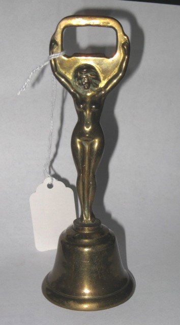 Brass figural female nude bottle opener / bell: Brass figural female nude bottle opener / bell- interior of bell 'made in England', good condition. 5 3/4''h