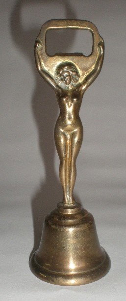 Brass figural female nude bottle opener / bell: Brass figural female nude bottle opener / bell- some wear, otherwise good condition. 5 3/4''h
