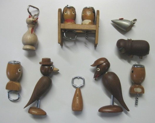 2 sets of wooden figural salt and pepper shakers: 2 sets of wooden figural salt and pepper shakers (corkscrew and opener)- along with 6 miscellaneous wood figural openers in forms of birds, cat, mouse, etc.- fair condition, various sizes.