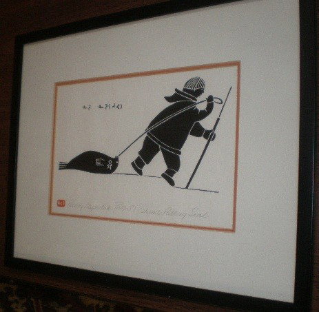Henry Napartuk stone cut: Henry Napartuk- Eskimo Pulling Sled- stone cut, signed and titled in pencil. 6 x 8 1/2''