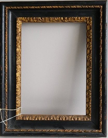Black lacquer and gilded hand-carved frame: Black lacquer and gilded hand-carved frame, many scrapes to finish. int 14 1/4 x 19 5/8'' ext 21 5/8 x 27 1/4 x 2 3/4''