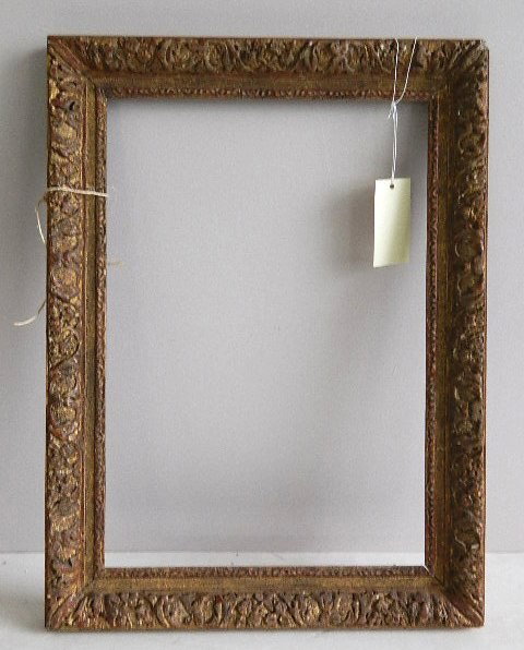 Hand carved wood frame: Hand carved wood frame with gilding, floral motif, minor losses. int 14 1/2 x 21 1/4'' ext 19 5/8 x 26 1/2 x 1 5/8''
