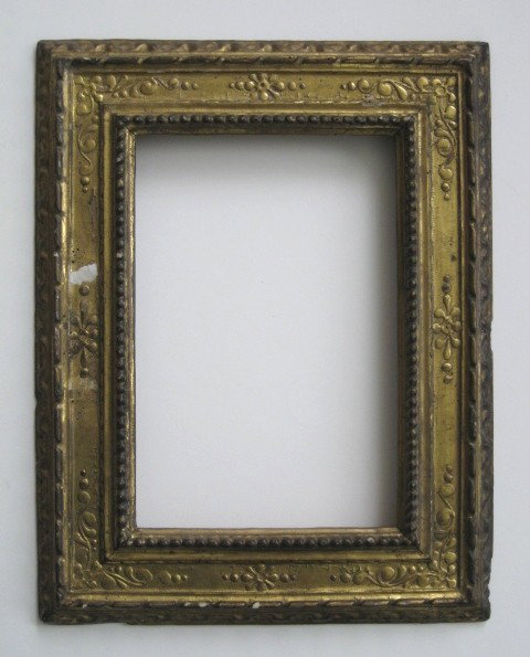 Hand carved gilded frame: Hand carved gilded frame, on bottom moulding, gilding gone to expose plaster, some minor losses. int 8 1/8 x 12 1/8'' ext 14 5/8 x 18 3/4 x 1 3/4''