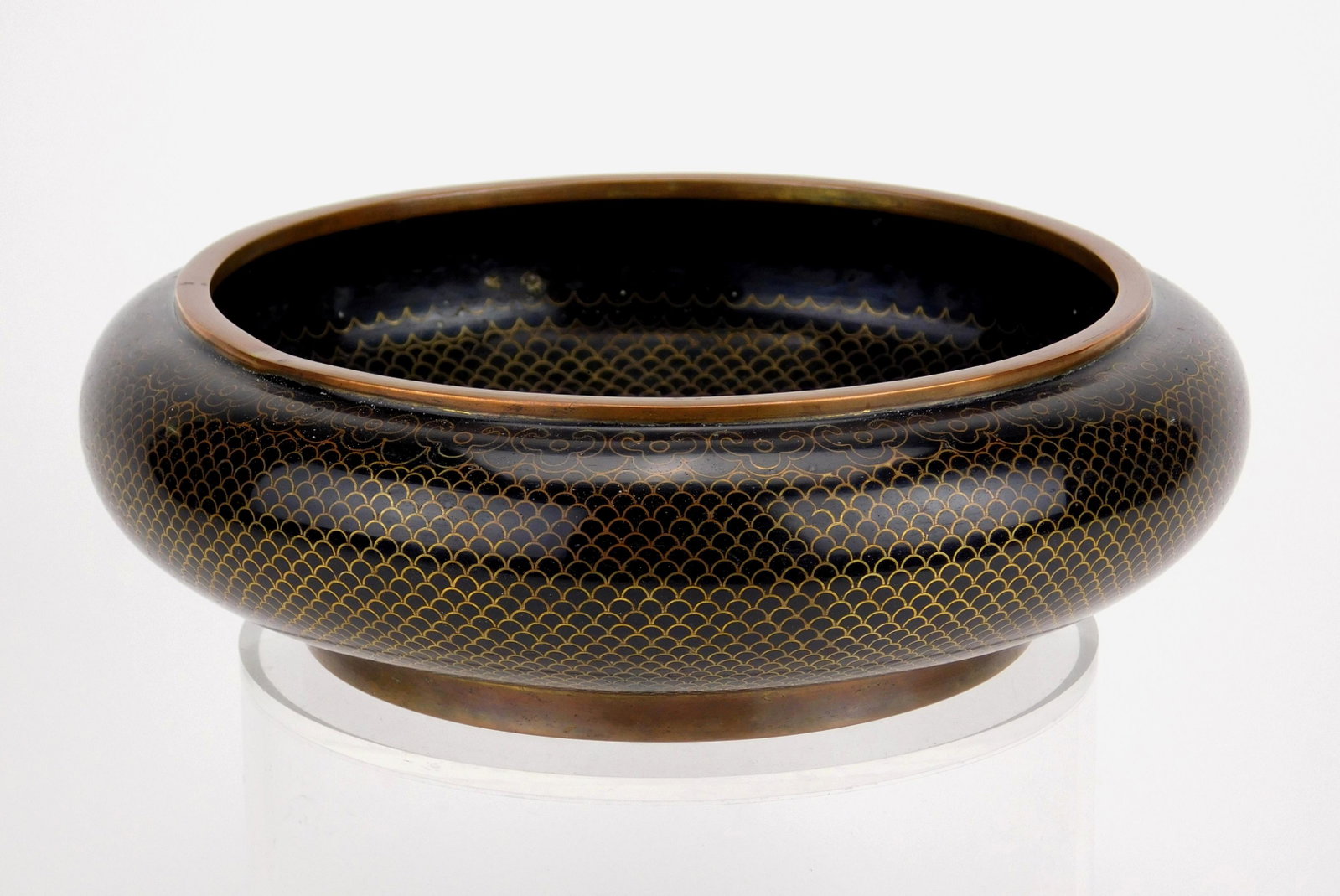 Chinese cloisonne bowl: Chinese cloisonne bowl- Lotus pattern throughout with longevity motif in center, marked 'China' on bottom. 8''dia., 2 1/2''
