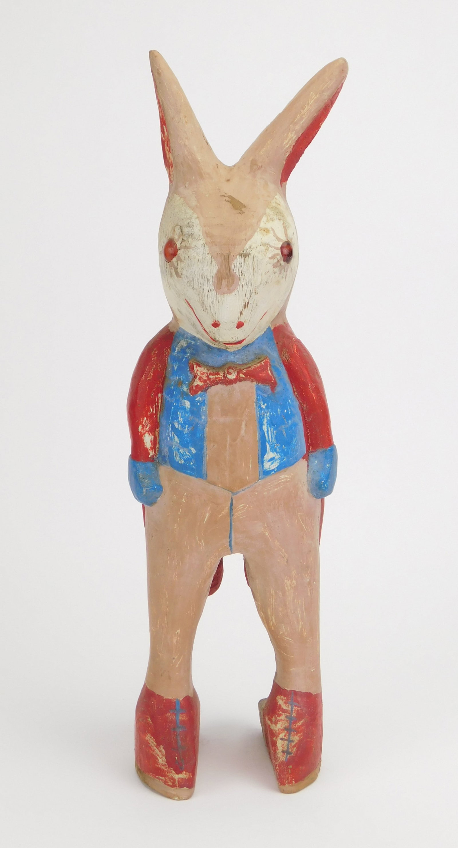 Silvio Zoratti wood sculpture: Silvio Zoratti (American 1896-1992) Rabbit in Red, White and Blue Coattails wood sculpture, 1963, painted with marble eyes, signed 'Silvio P./ Zoratti/ 1963' on underside. 16
