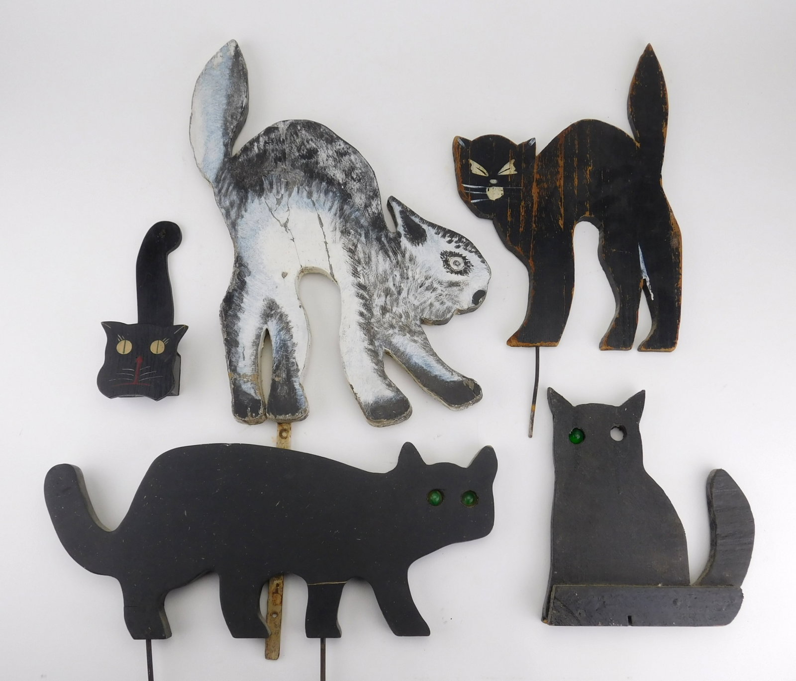 5 Folk art wooden cat cut-outs: 5 Folk art wooden cat cut-outs. 16 1/2 x 13 1/2" (largest, without stake)