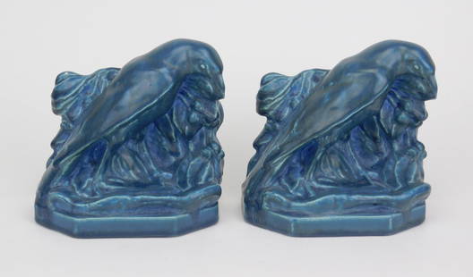 Pair of Rookwood bookends: Pair of Rookwood Rook bookends, done in blue mat glaze, 1930, marks include Rookwood logo, the date, shape # 2275 and the cast monogram of designer William Mc Donald, 5 1/2"h