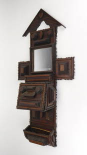 Tramp Art wall piece: Tramp Art wall piece, with mirror, a shelf, a drawer and wall pocket, various chips, shelf/drawer and wall pocket at bottom are detached. 34 x 16 1/2 x 6"