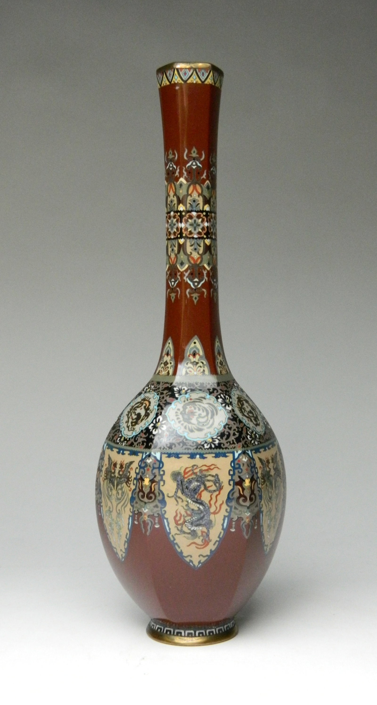 Japanese cloisonne vase, attrib. to Kinunken: Japanese cloisonne vase- hexagon shaped, dragon and phoenix motif, minute patterns, attributed to Kinunken. 9 1/2''h Provenance: Private collection- Jamestown, NY Condition: One small nick to