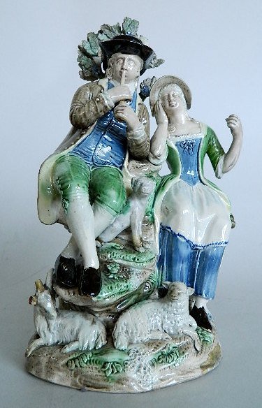 2 John oyez Staffordshire figurines: 2 John Voyez Staffordshire pottery figurines- The Birdcage & Shepherd and Shepherdess; both have repairs and restoration. 9 1/2; 11''h