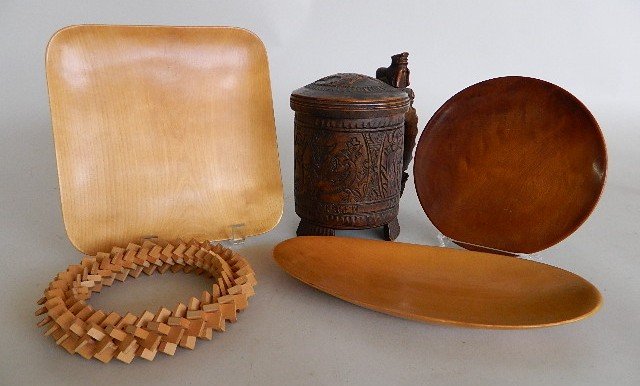 12 Carved wood objects: 12 Carved wood objects- including a mug with intricately carved Adam & Eve; Swedish- oval dish, 'trivet' and square plate; myrtle wood shed; 18th c. English oak panels, Italy capital and moulding; Tai