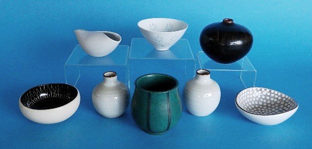8 Scandinavian ceramic vases: 8 Scandinavian ceramic vases- 2 Arabia; 2 Fris Studio white bottle vases; Ingrid Atterberg 'Polka Dot' bowl; 2 Gustavsberg and 1 Friedl Kjellberg bowls- note: Argenta series bowl has chip.