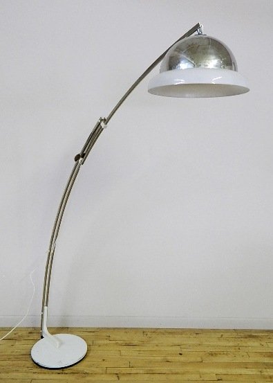 Reggiani floor lamp: Reggiani floor lamp- painted metal base, with elongated chrome arched arm, and chrome and translucent white shade, some wear. 72''h