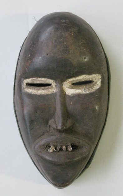 Dan or Mano Liberia Cote d'Ivoire Deangle mask: Dan or Mano Liberia Cote d'Ivoire Deangle mask- wood, cloth, metal, all danced by men, Dan mask forms may be viewed as male or female and may be used for entertainment, judicial or supervisory functio