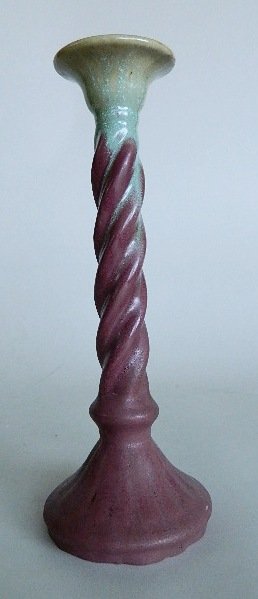 Fulper pottery twist form candlestick: Fulper pottery twist form candlestick, matte maroon glaze, ink stamp on bottom, 11 1/2''h