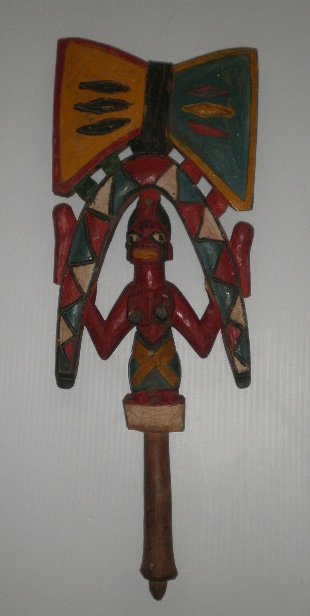 Yoruba/Nigeria Oshe Shango dance wand: Yoruba/Nigeria Oshe Shango dance wand- depicts a devotee of the thunder good Shango, wood and pigment, overall good condition, insect damage to figure's right breast, holes drilled (?) or bored (insec