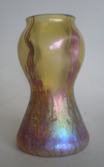 Loetz iridescent glass vase: Loetz iridescent glass vase, hour glass form with thumb print design, unmarked. 6 1/4''