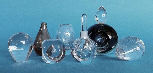 18 European glass pieces: 18 European glass pieces: including Kosta- bird, crystal paperweight, hedgehog and perfume bottle; Orrefors- vase and scent bottle with stopper; Oskar Simon etched vase; and more paperweights and dish