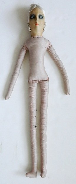 Attrib. to Lenci fabric doll: Attrib. to Lenci fabric doll- Female, with painted face and hair made with cotton threads, some soiling and staining, few spots of abrasion, small tears. 30 1/2''l.