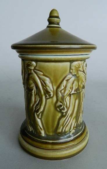 Rookwood standard glaze pottery humidor: Rookwood standard glaze pottery humidor, 1919, column form, ornamented with a band of classical figures, marks include Rookwood logo, date and shape #2468. 6 1/2''h