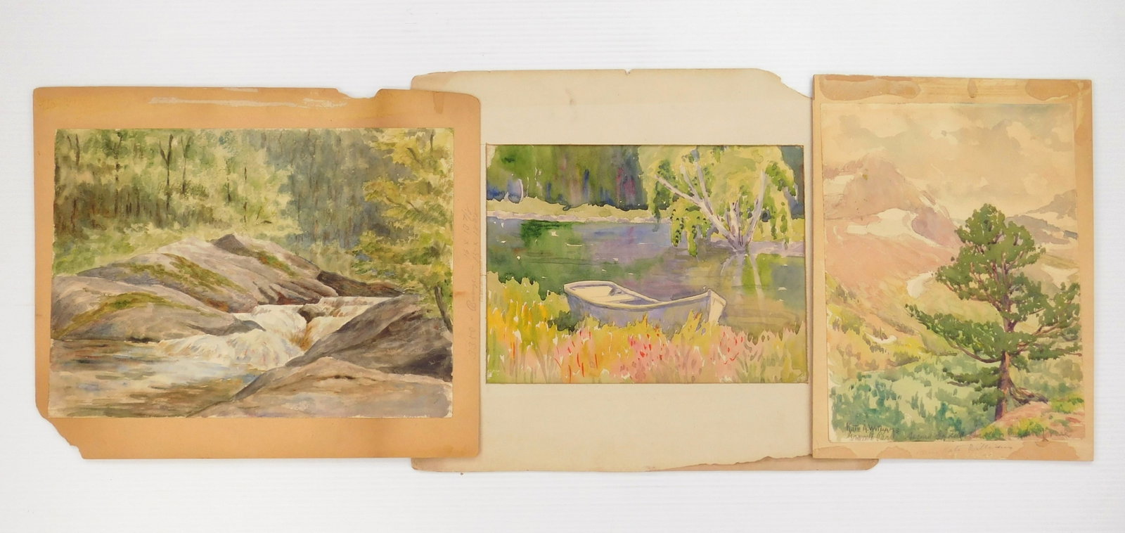 Kate A. Williams (American, 1877-1939) watercolors: Granite Park; Water over Rocks & Canoe in Water 3 watercolors on paper, 1 signed and titled. 10 x 13 7/8" (largest) Condition: Mounted to cardboard Pro