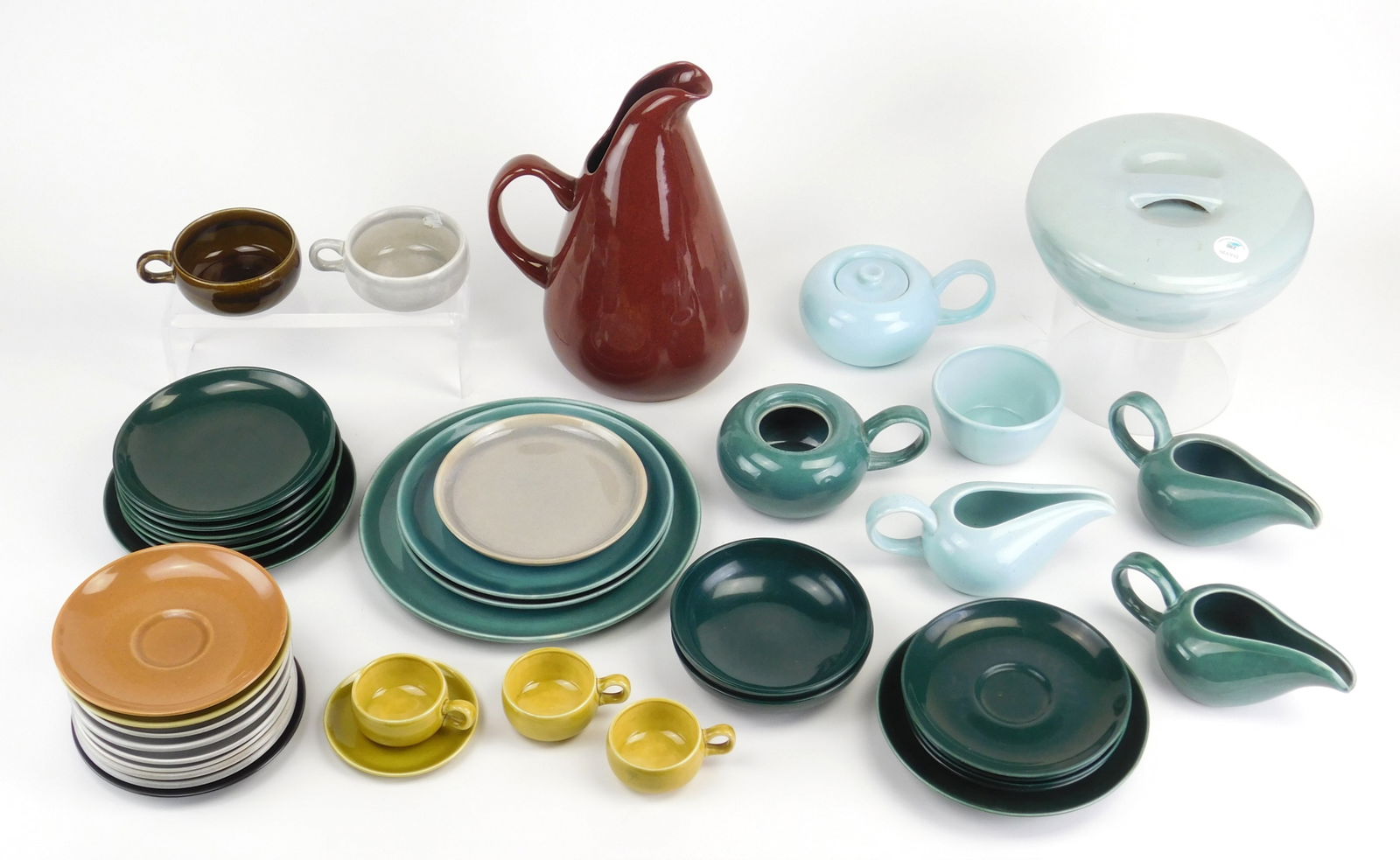 Russel Wright (American, 1904-1976) dinnerware: manufactured by Steubenville pottery, 41 pieces, including 14 saucers; 8 small plates; 2 small bowls, 3 creamers and 2 sugars (only 1 with lid); 2 cups, 3 small cups with 1 saucer; small bowl; 1 pitch