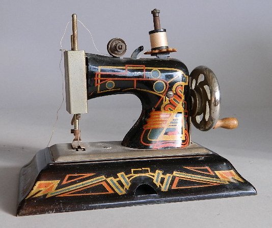 Casige miniature sewing machine: Casige (German) miniature sewing machine.