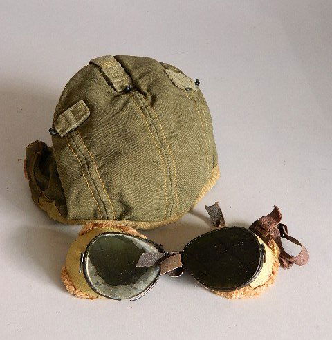 U. S. Military vintage aviator cap and goggles': U. S. Military vintage aviator cap and goggles'.