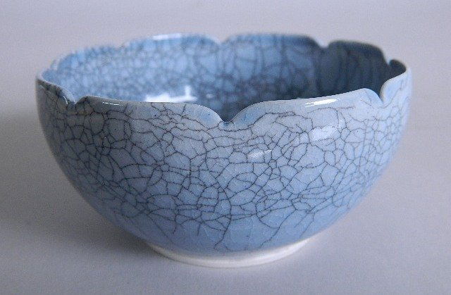 Elsa Rady porcelain bowl: Elsa Rady porcelain bowl, 1976, blue crackle glaze, signed on bottom. 2 1/4 x 4''