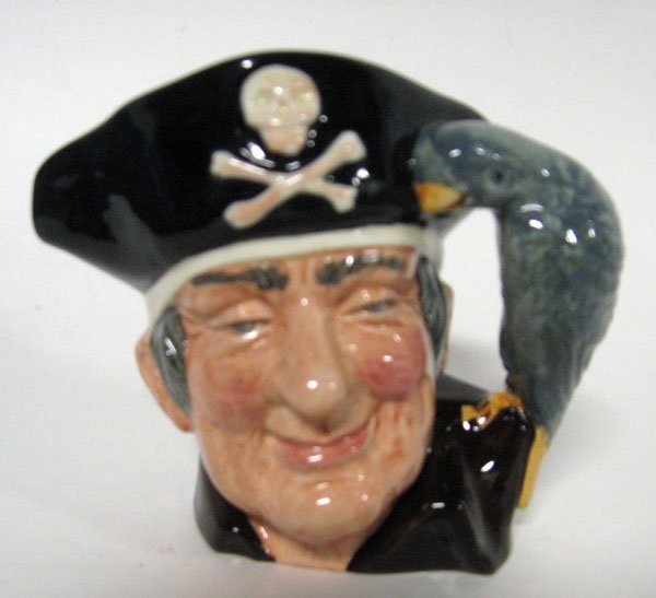 3 Royal Doulton mugs: 3 Royal Doulton mugs- ''Long John Silver'' D6386, dated 1951; ''V King'' D6502, dated 1958; and ''Cap't Ahab'' D6506, dated 1958, overall good used condition. 4''h