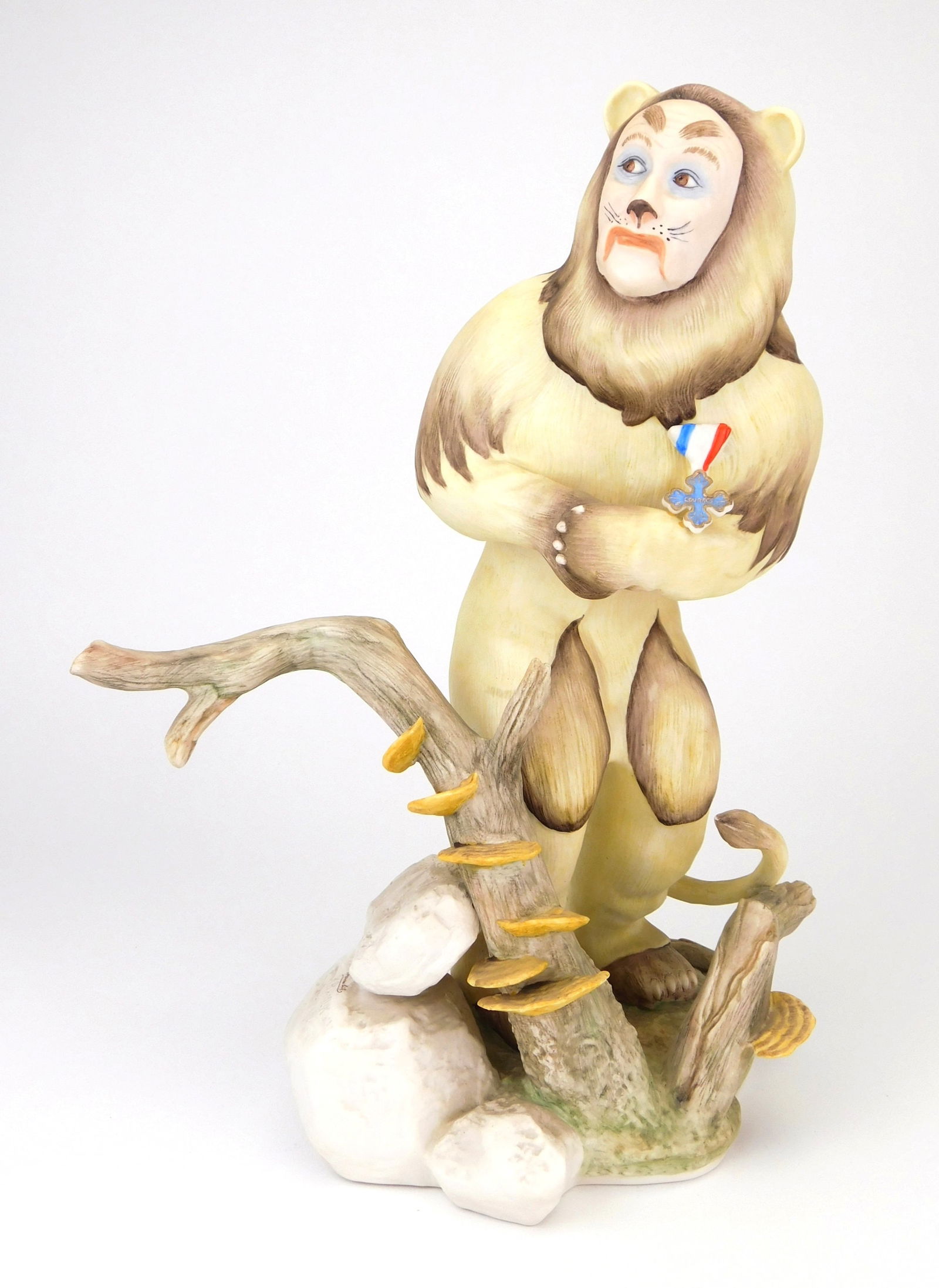 Goebel bisque figurine- Wizard of Oz: The Cowardly Lion bisque figurine created by Balint Kramlik. Numbered 76/500, produced by House of Goebel. 13 3/4"h Bert Lahr played the role of The Cowardly Lion in the original movie