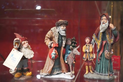 3 History of Santa collectible figurines