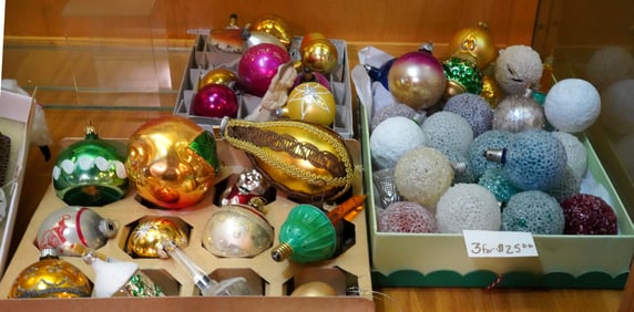 Lot of vintage Christmas ornaments and lights.