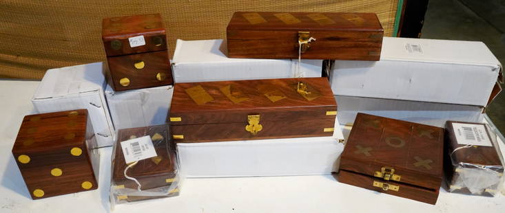 14 game boxes: wood with brass inlay, 4 dice boxes each with 5 inlaid dice (1 box is warped); 7 domino boxes; 1 box with telescope and 1 tic-tac-toe box (box is warped and inlay lifting).&nbsp;&nbsp;