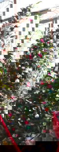 Mr. Christmas's Christmas tree: Mr. Hixson personal Christmas tree as set up in his home with his favorite ornaments.&nbsp; 72&quot;