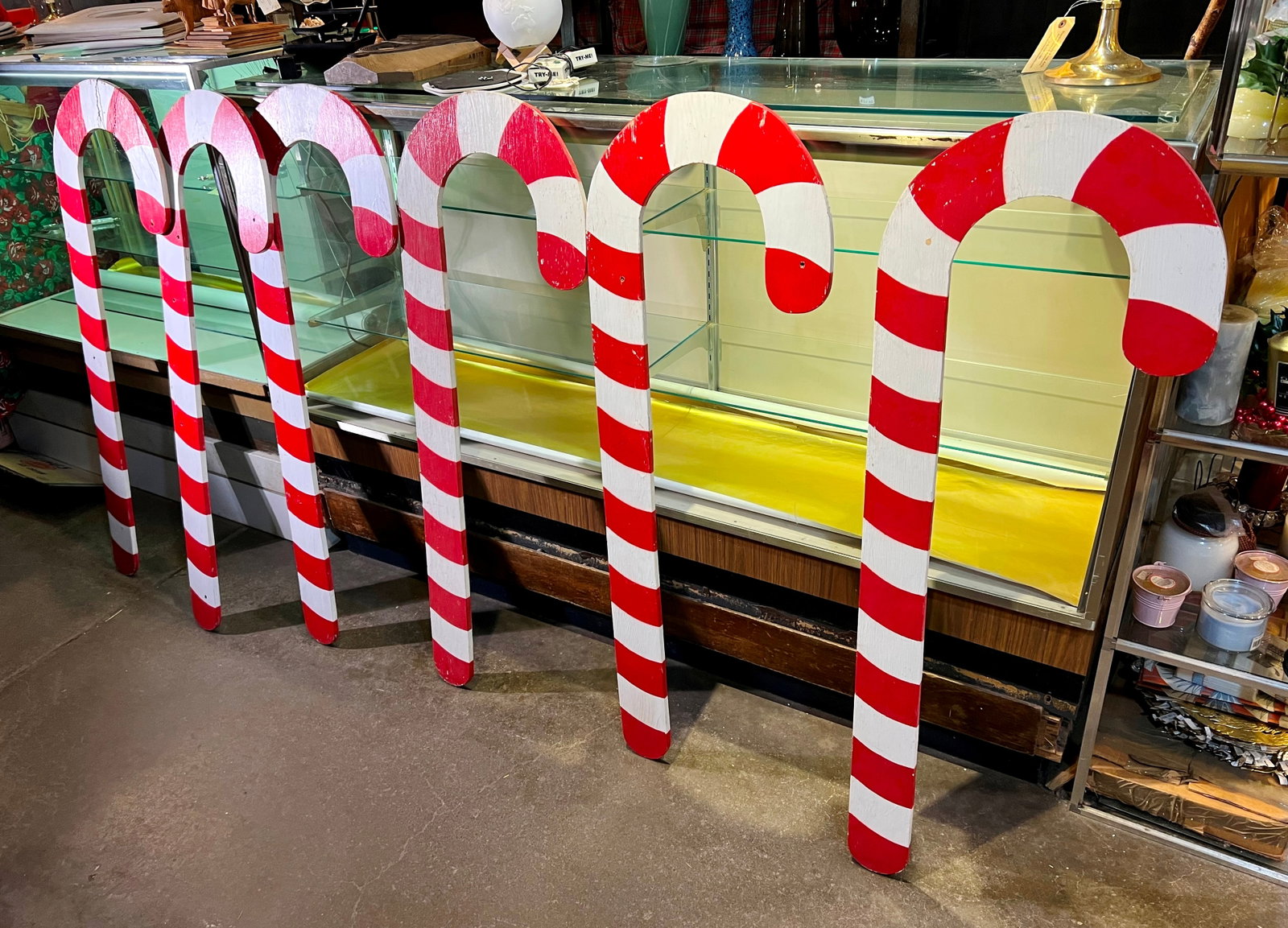 Set of 6 wooden candy canes: painted on 1 side. 4'h, 17"w