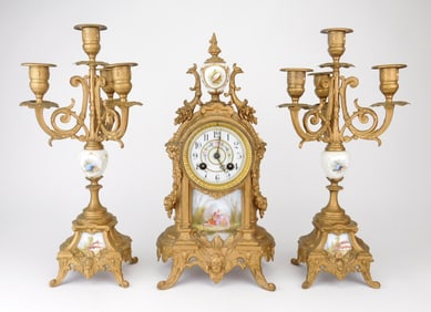 AD Mougin bronze and porcelain clock et.