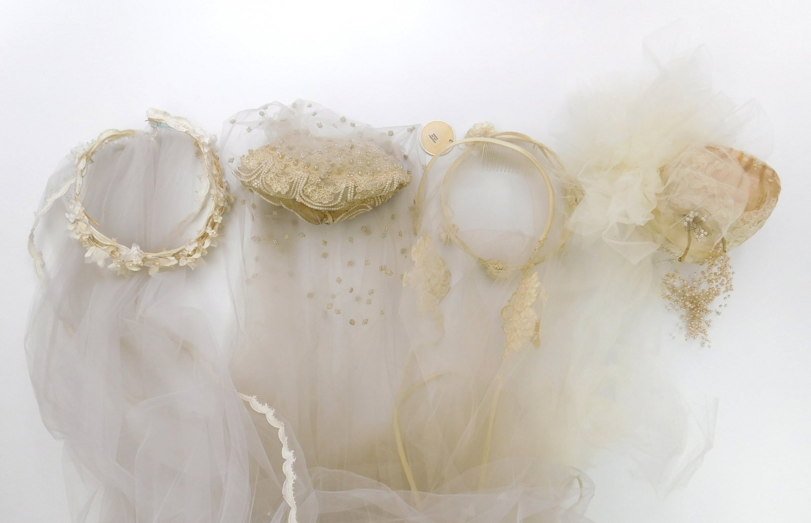 4 Bridal veils: 2 vintage Priscilla of Boston Bridal Veils both Chapel length and both have labels in headpieces. together with an unmarked veil, waltz length and a vintage House of Bianchi with headpiece and s