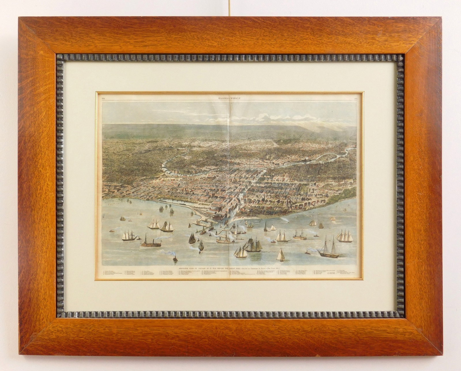 after Theodore R. Davis wood engraving: Bird's Eye View of Chicago as it was Before the Great Fire wood engraving with hand-coloring, as published in Harper's Weekly (double page), framed. 15 x 21 1/2" Provenance: Private colle