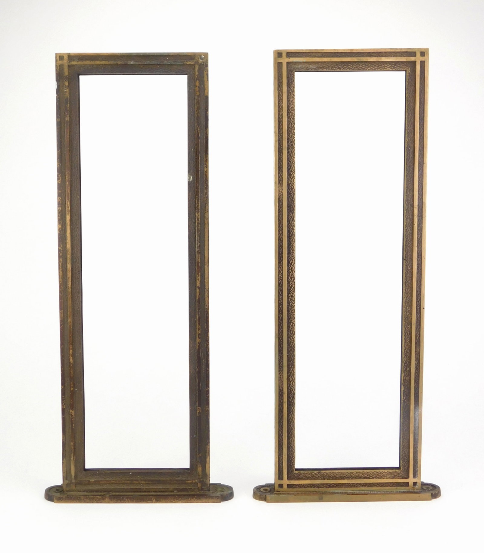 Pair of bronze table top frames.: 19 1/2 x 8 1/8 x 1 3/8" Provenance: Private collection- Ashtabula, OH *** PLEASE READ: IMPORTANT NOTE About S&H *** S&H of this auction will be handled by "Shipping with LiveAuctioneers" unless
