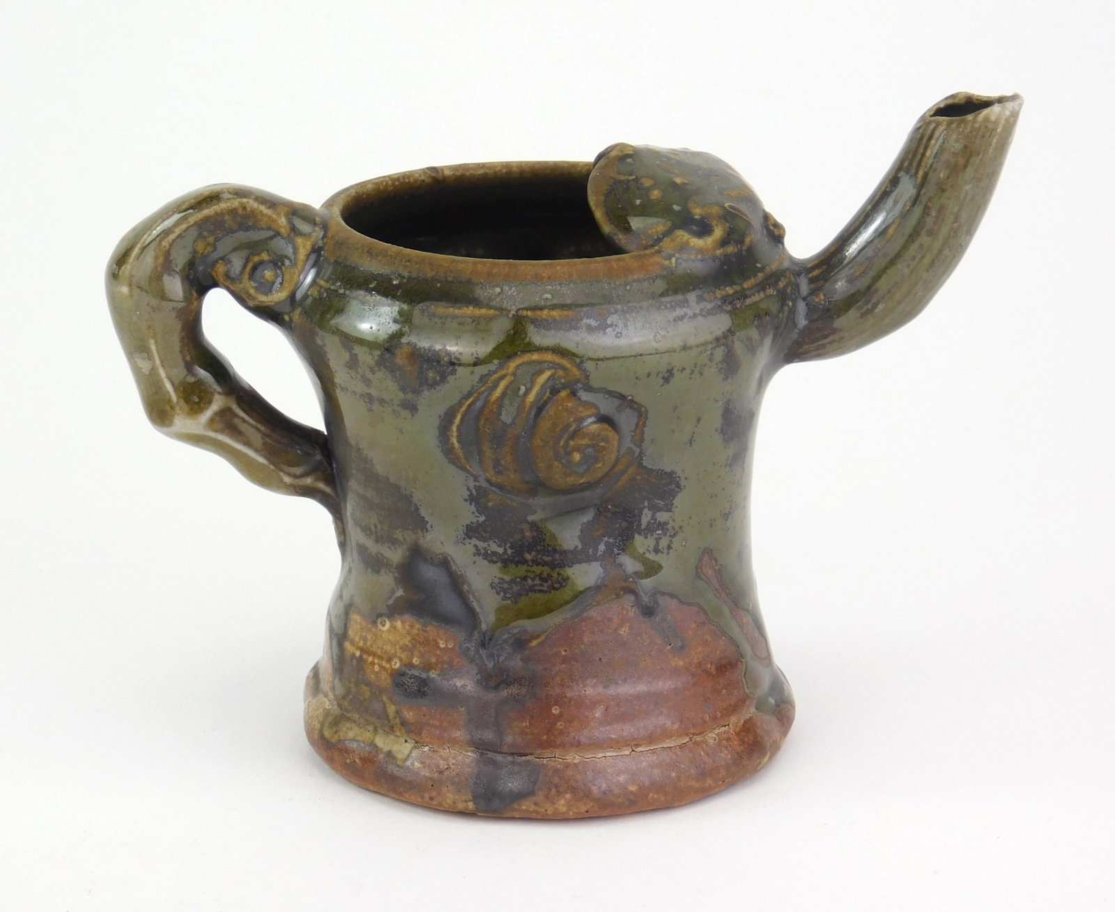 John Glick (American, 1938-2017) pitcher for Plum Tree Pottery: glazed pitcher, stamped Plum Tree Pottery and incised Glick signature.4"h Provenance: A Canton area non-profit *** PLEASE READ: IMPORTANT NOTE About S&H *** S&H of this