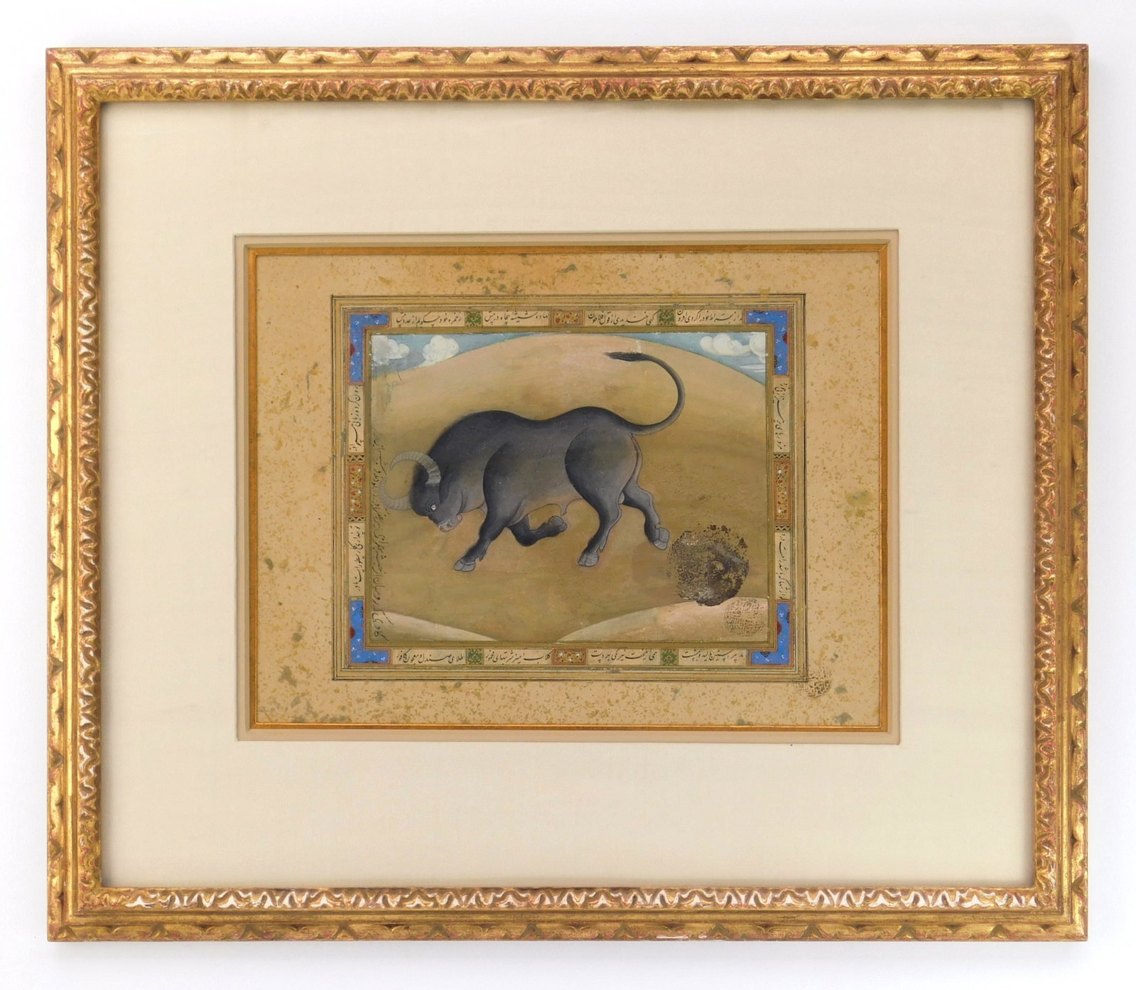 18th/ 19th c. Indian miniature painting , Mughal: Bull watercolor and gouache on paper, with decorative gilt border, matted and framed. 9 1⁄2 x 6 3⁄4” Provenance: Private collection- Bay Village, OH *** PLEASE READ: IMPORTANT NOTE