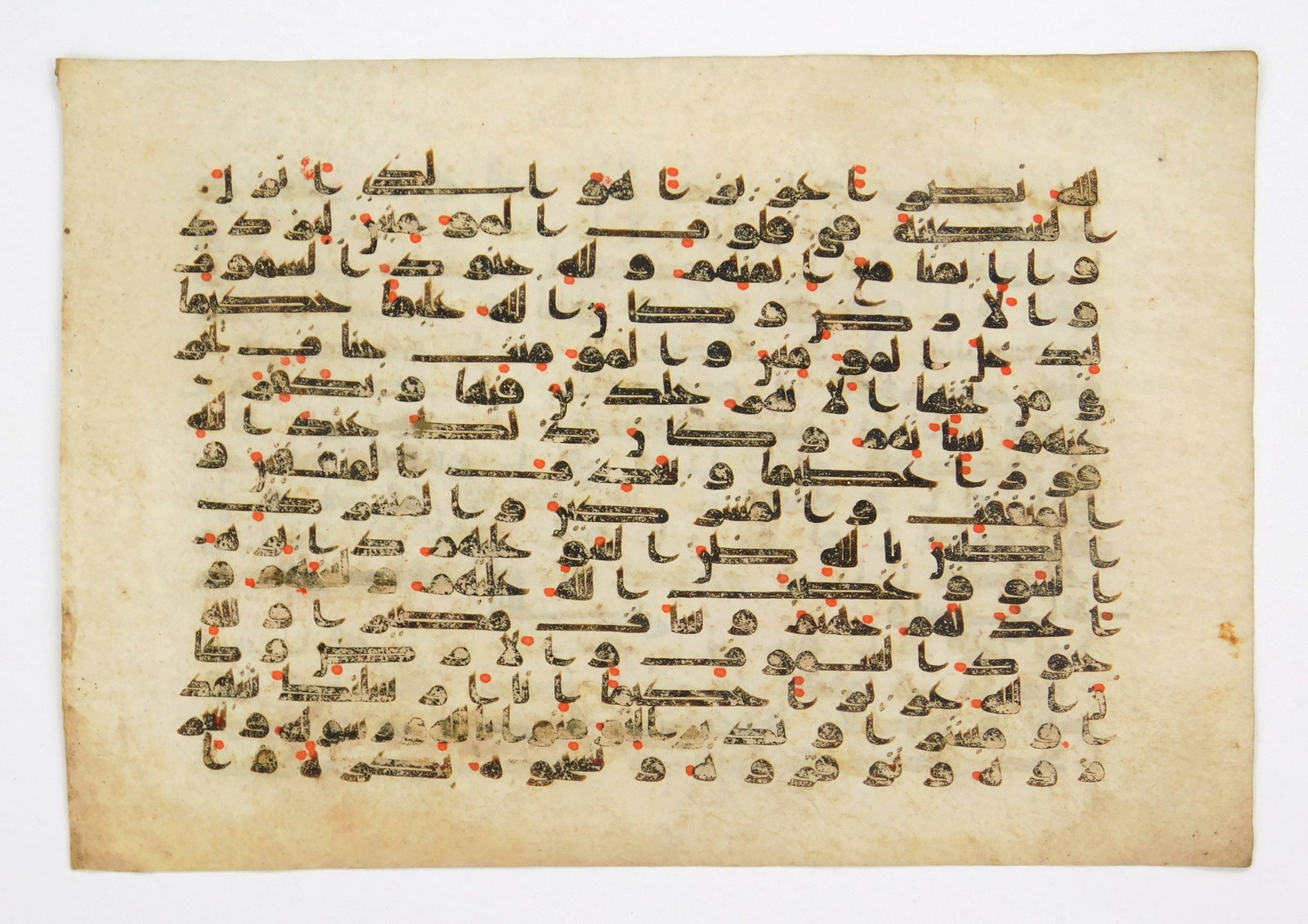 A Kufic Qur'an leaf on vellum (1 of 4)