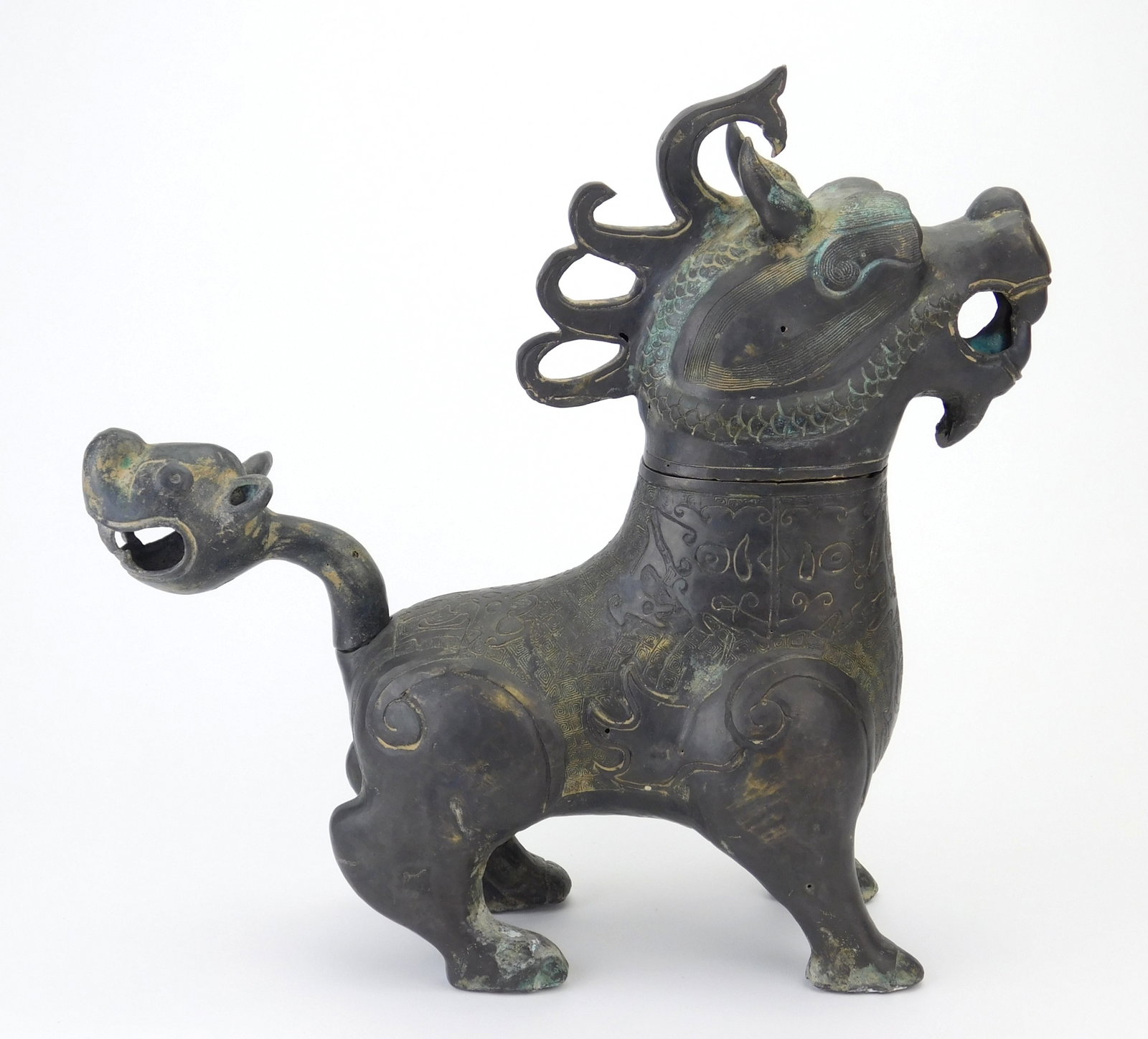 Chinese bronze mythical beast sculpture: possibly a Luduan or Qilin incense burner. 13"h Provenance: Private collection- Bay Village, OH *** PLEASE READ: IMPORTANT NOTE About S&H *** S&H of this auction will be handled by