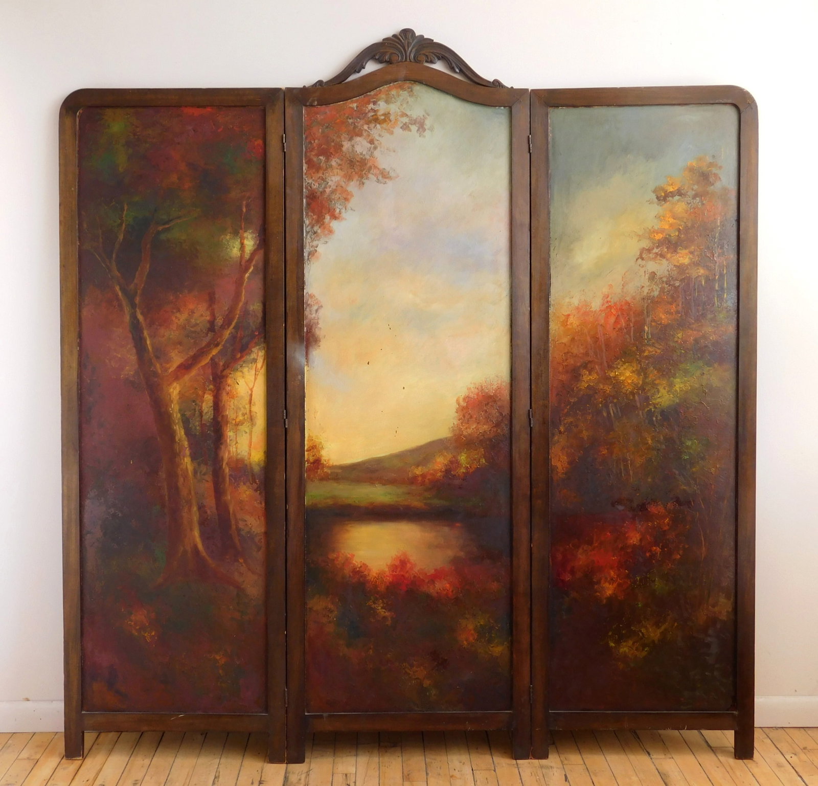 3 Fold Painted Leather Screen: painted with fall landscape and floral bouquets on verso. central panel has carved crest. 72 x 66" (open). Provenance: Private collection- Ashtabula, OH *** PLEASE READ: IMPORTANT NOT