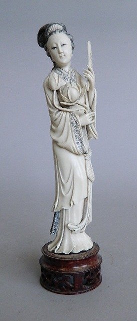 Chinese ivory figure: Chinese carved ivory figure- Geisha girl with lotus flower and mirror. 10''h