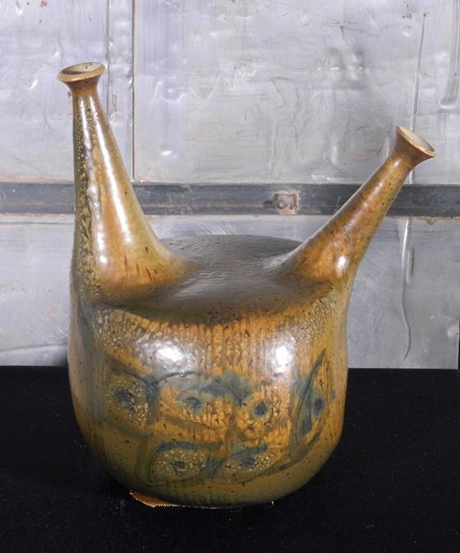 Toshiko Takaezu ceramic vessel: Toshiko Takaezu (American 1922-2011)- Double Spout Vase- ceramic vessel, signed with monogram on the base. 10''h Provenance: John Paul Miller Collection, Cleveland, Ohio.