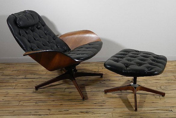 George Mulhauser lounge chair and ottoman: George Mulhauser lounge chair and ottoman by Plycraft, molded walnut shell, four pointed chromed steel base.