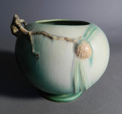 Roseville Pottery Pine Cone green vase: Roseville Pottery Pine Cone green vase, bulbous form, gold foil label. 6''h