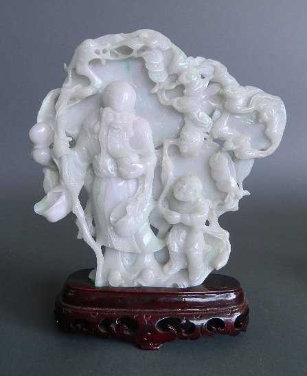 Carved white jade figurine: Carved white jade figurine- Man and Young Boy. 7 1/2''h